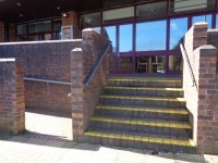 Ramp (left) and steps (right) to the main entrance