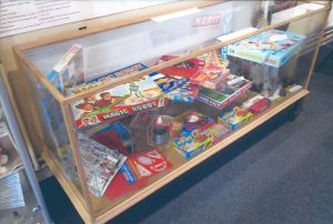 Display cabinet in the Potters Bar Museum showing Merit Toys